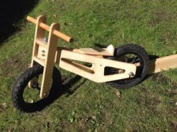 Деревянный детский велосипед